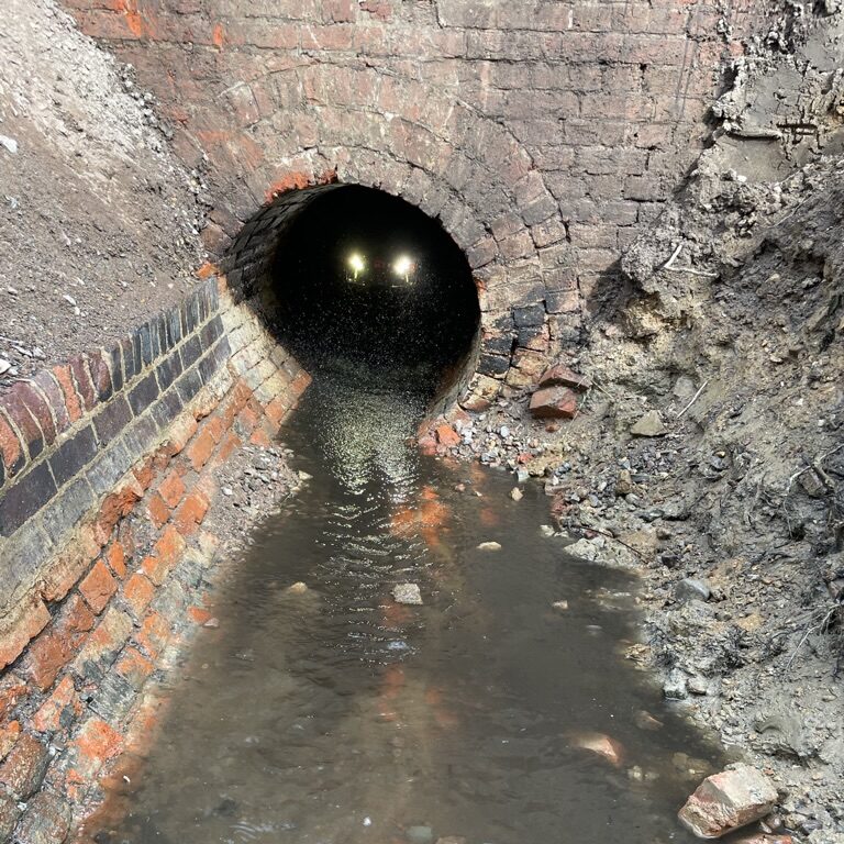 Elios confined space drone returning after mapping a 70 m culvert under network rail infrastructure